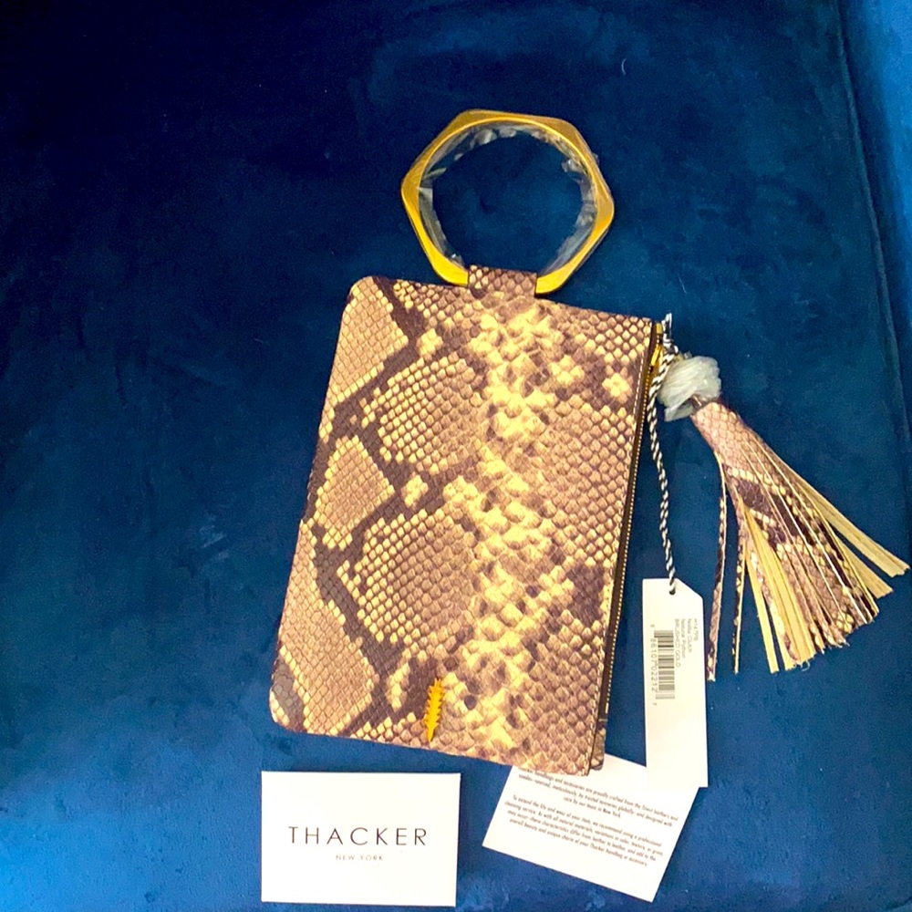 Wristlet snakeskin clutch so cute!